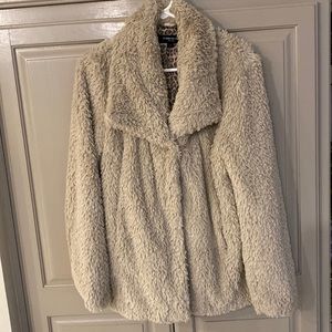 Kenneth Cole fuzzy jacket.  Worn one. perfect condition.  Non-smoking home.